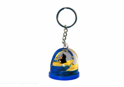 Floating Cube Keychain featuring a black bear in a kayak design