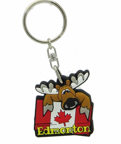 Rubber key chain featuring a charming moose and Canadian flag design, representing Edmonton. A perfect accessory to showcase your love for Canada and Edmonton