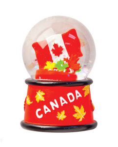 Magnetic snow globe featuring the Canada flag design, a patriotic and decorative piece to celebrate Canadian pride