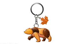 Wooden keychain featuring a blocking bear design