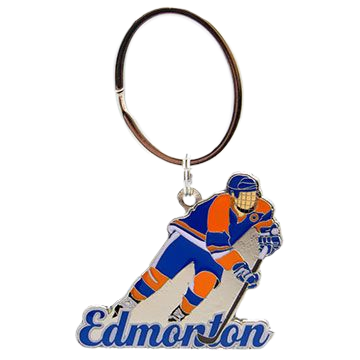 Edmonton souvenir keychain featuring a hockey player design in classic Oiler team colors. Perfect keepsake for Edmonton Oilers fans